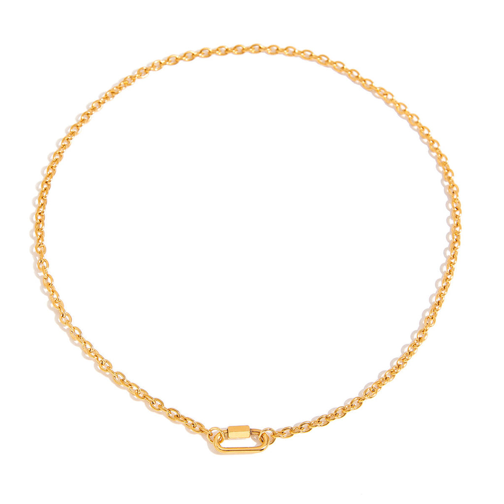 Gold chain necklace with carabiner lock on a white background. paperclip chain necklace gold, carabiner lock necklace, gold link necklace
