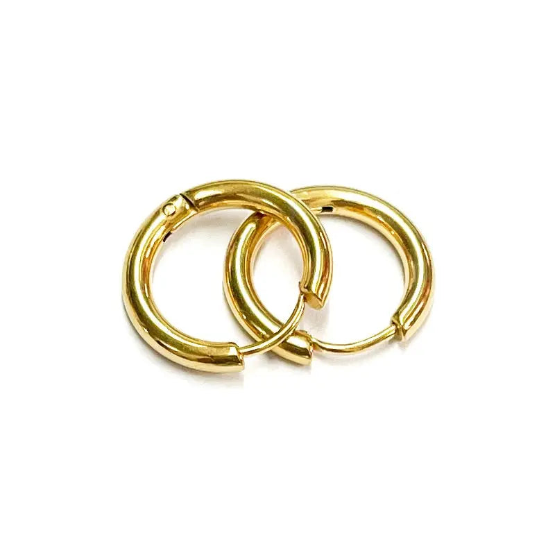 gold hoop earrings on a white background.  Classic hoops, minimalist hoops, everyday stainless steel earrings