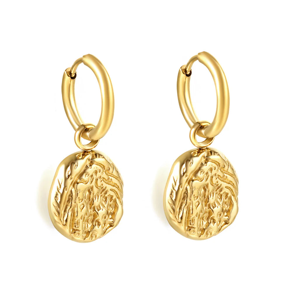 Gold hoop earrings with textured drop earring on a white background. gold drop earrings, vintage style earrings, statement drop earrings