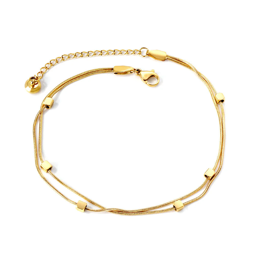 Gold anklet with a clasp on a white background. square charm anklet gold, geometric anklet, gold anklet minimalist