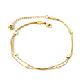 Gold anklet with a clasp on a white background. square charm anklet gold, geometric anklet, gold anklet minimalist