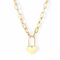Gold heart-shaped lock necklace on a white background 