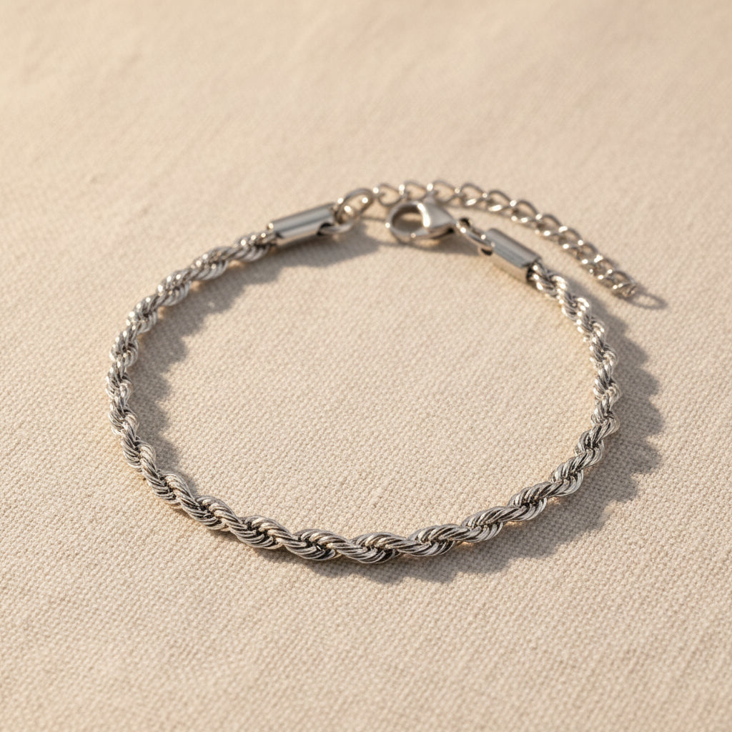 Silver chain bracelet on a white background. rope chain bracelet silver, silver chain bracelet, textured bracelet