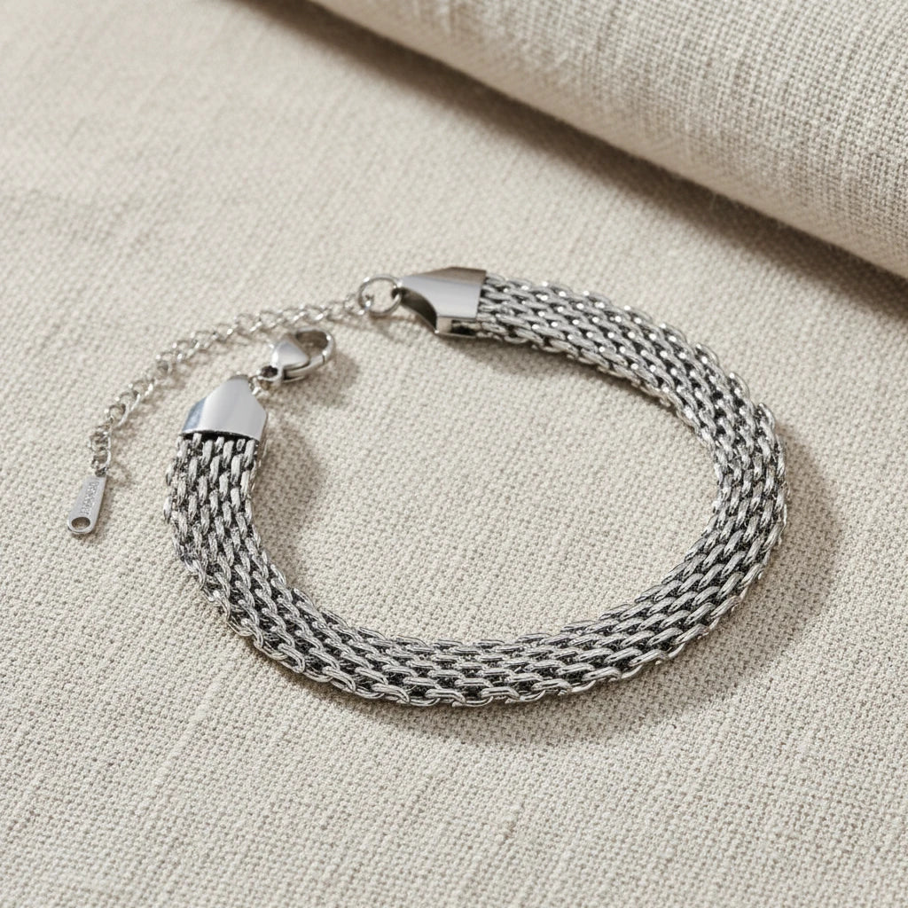 Silver mesh chain bracelet on a white background