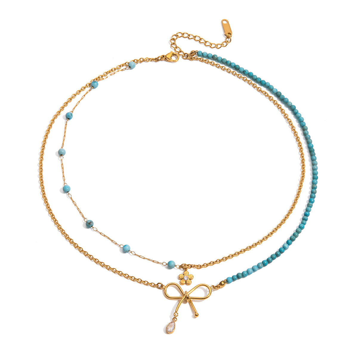 Two layered necklaces with gold and blue turquoise stone beads with a bow and flower on a white background