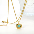 Gold necklace with a turquoise pendant on a white background. turquoise pendant necklace gold, geometric stone necklace, blue stone necklace